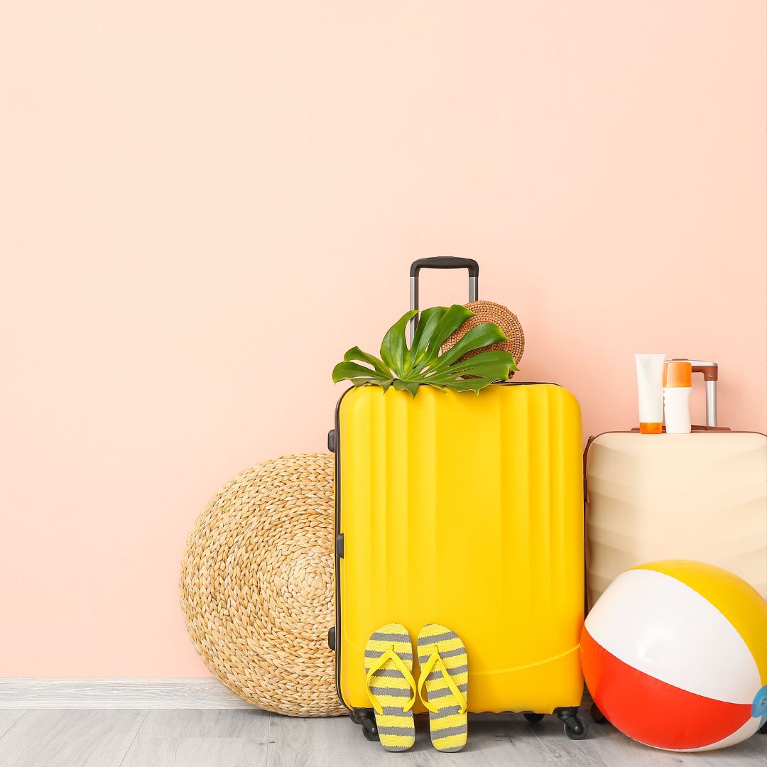 Healthy travel snacks, water bottle and oral rehydration sachets packed for gut-friendly travel.